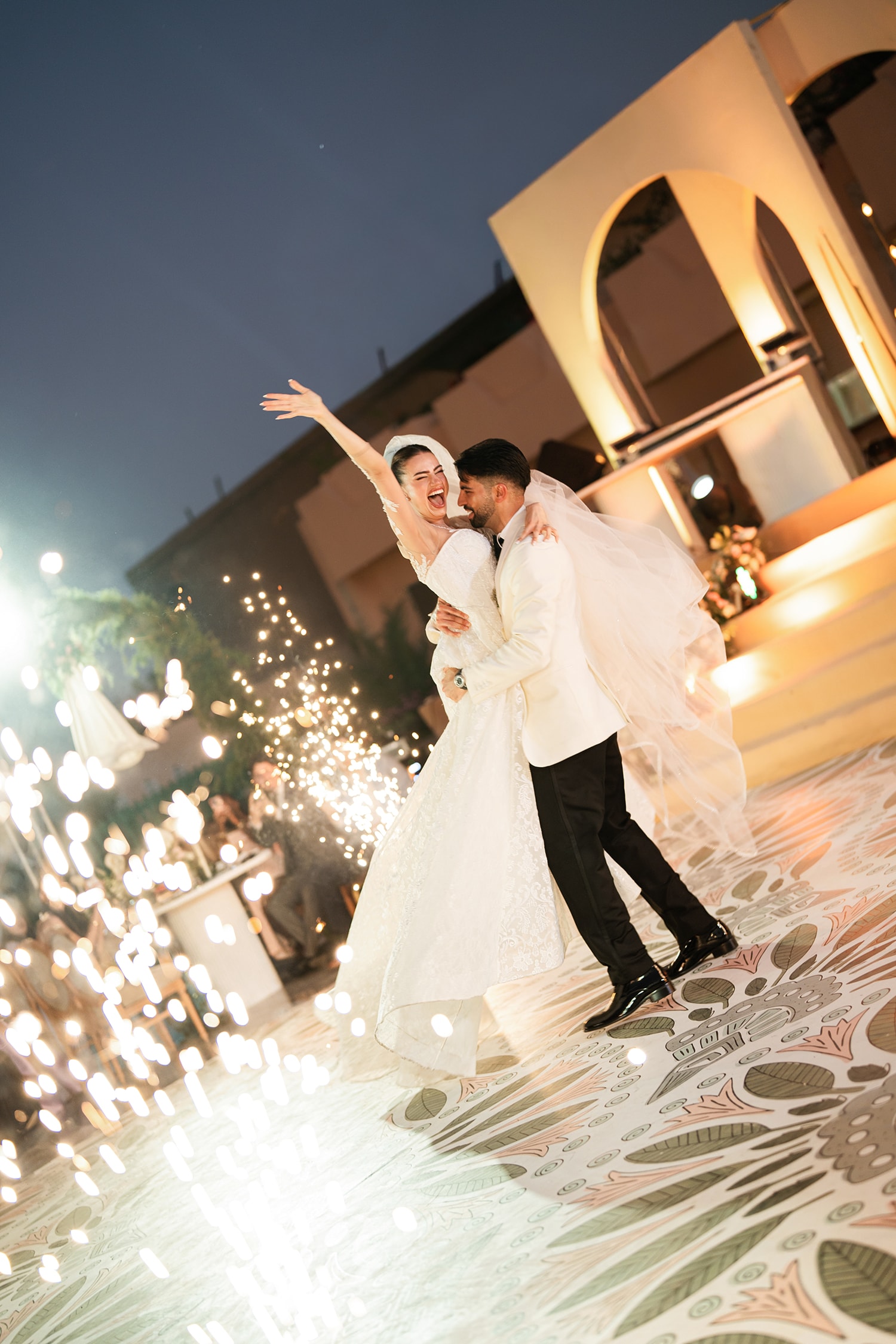 Couple in formal attire embracing tenderly