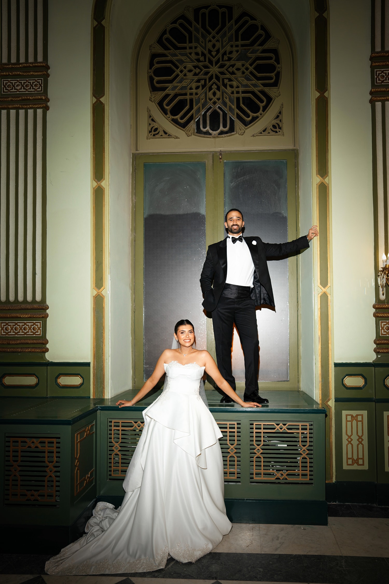 Bride groom formal portrait ornate architecture