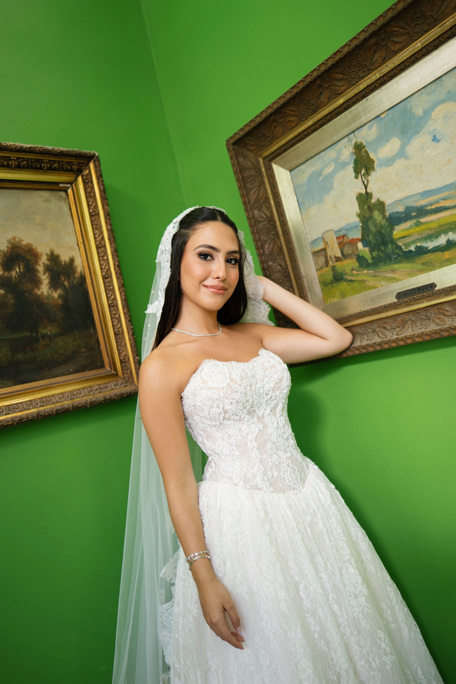 Bride in white gown with veil portrait